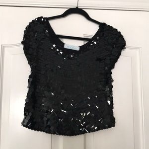 Khloe short sleeve sequined top.  Size M, 65% Cotton, 35% Rayon.